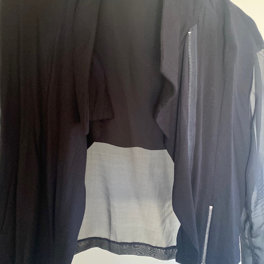 Beautiful mesh sleeve and back jacket never worn
